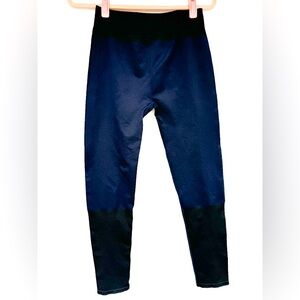 Fabletics, high-waisted legging, dark navy blue and black color block  Size: L